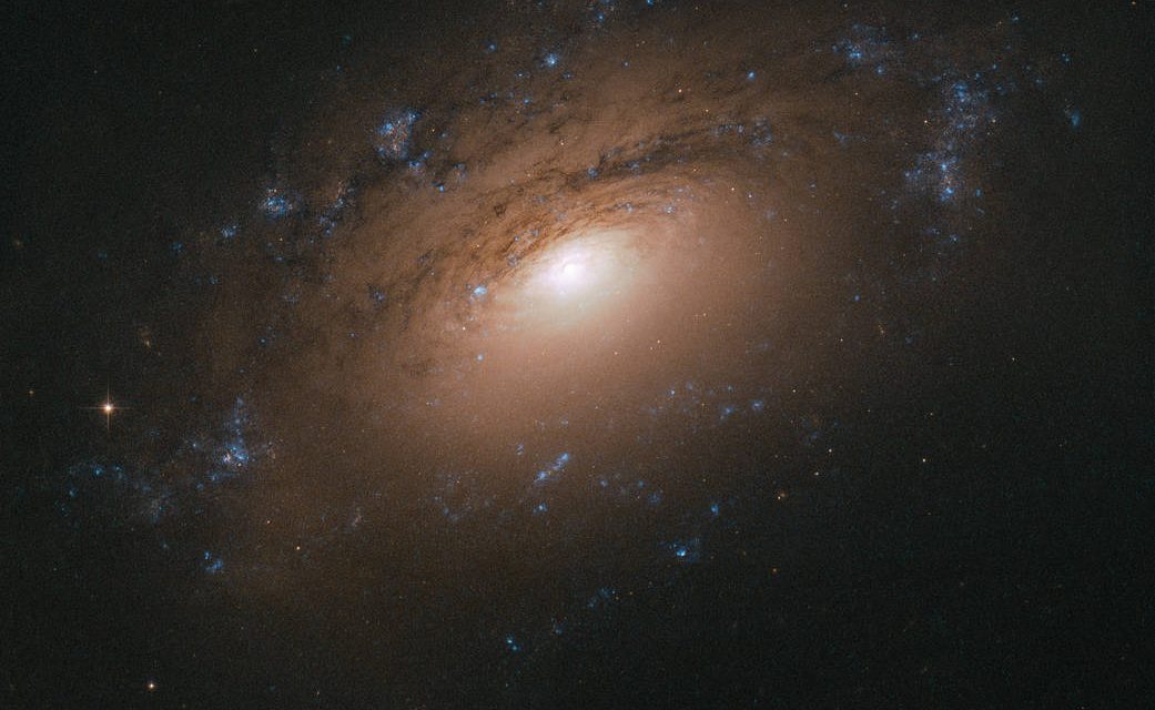 Hubble Snaps a Galactic Potpourri of Particles