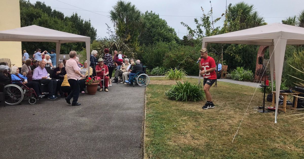 Falmouth based care home doesn’t let rain dampen spirits and raises more than £250 from summer fete